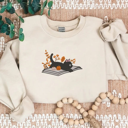 Embroidered Halloween Cat Sweater, Vintage Black Cat Lying on Book Sweatshirt