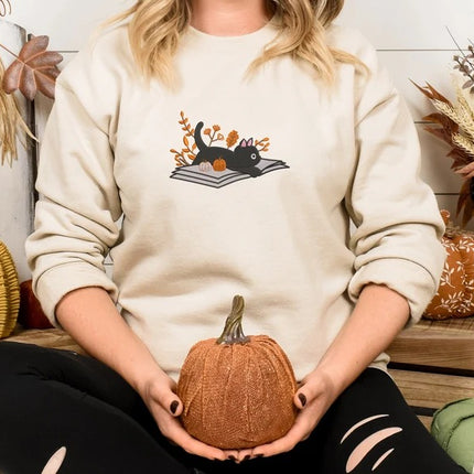 Embroidered Halloween Cat Sweater, Vintage Black Cat Lying on Book Sweatshirt