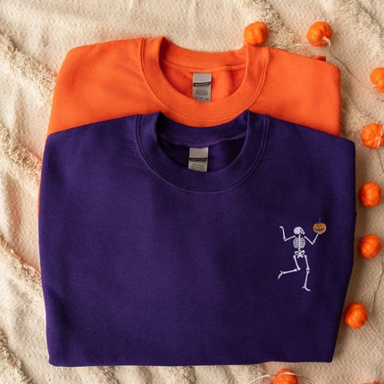 Dancing Skeleton Embroidered Sweatshirt, Funny Skeleton Carrying Pumpkin Halloween Monogrammed Jumper, Spooky Season Halloween Party Outfits
