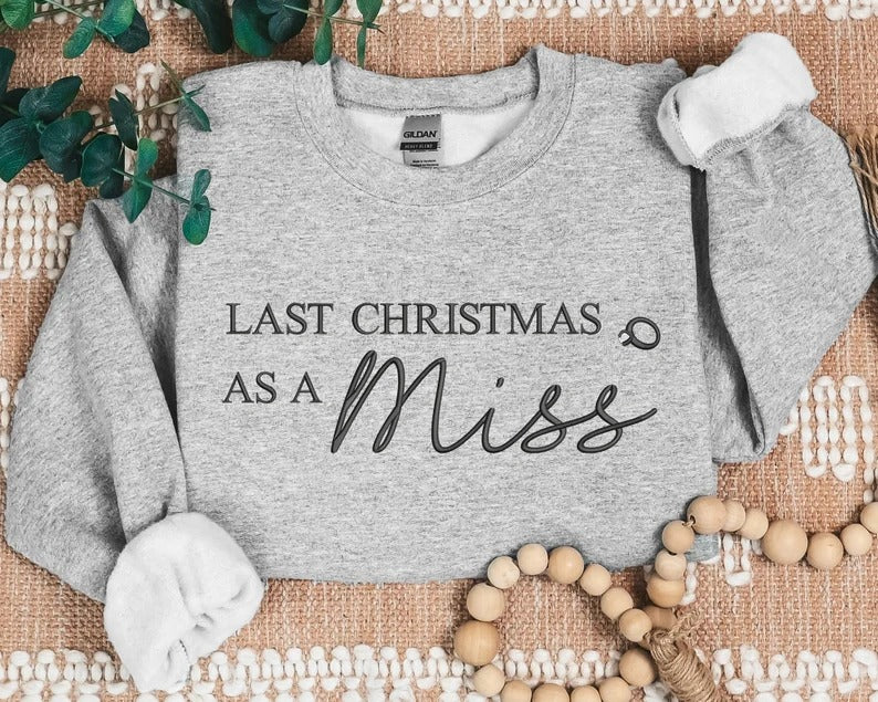 Last Christmas as a Miss Sweater, Embroidered Christmas Sweatshirt, Xmas Engagement Gift for Her, Future Mrs Bride To Be Christmas Jumper