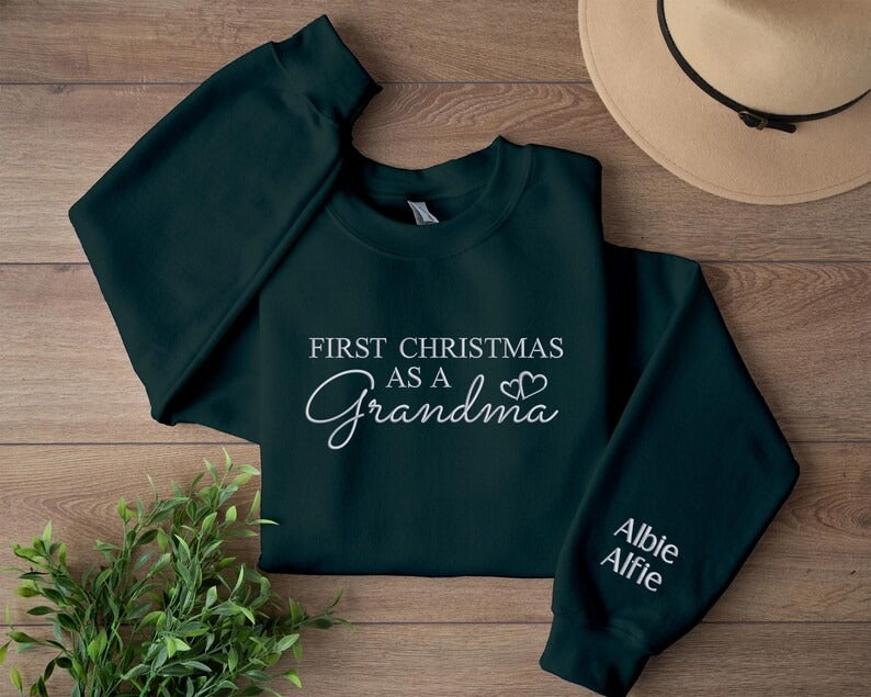 First Christmas As A Grandma Sweatshirt, Embroidered Christmas New Grandma Sweatshirt, Custom Grand Mother Name on Sleeves, Christmas Gifts