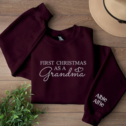 First Christmas As A Grandma Sweatshirt, Embroidered Christmas New Grandma Sweatshirt, Custom Grand Mother Name on Sleeves, Christmas Gifts